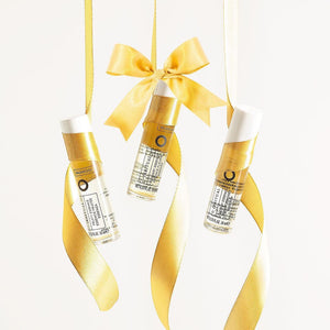 Vagheggi skincare products hanging from a golden ribbon