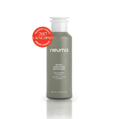 Re Neu Conditioner bottle with Peppermint and Vanilla, promoting shiny, healthy hair and scalp. 2017 Award Winner.