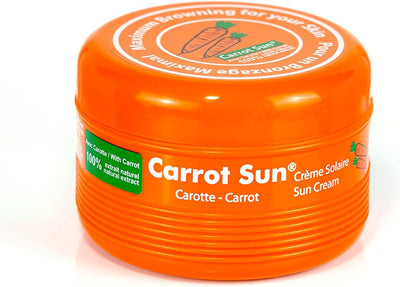 Carrot Sun tanning cream jar with carrot oil for a natural, deep tan in an orange container.