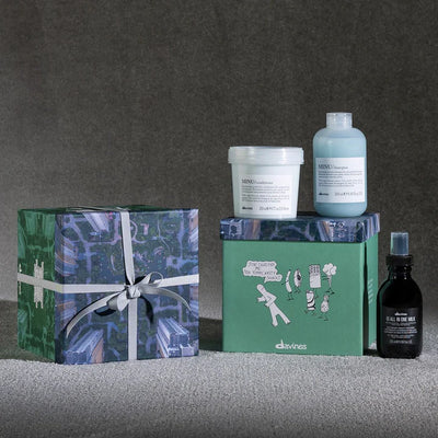 Minu Oi Gift Set by Davines featuring shampoo, conditioner, and all-in-one milk, elegantly packaged for vibrant colored hair.