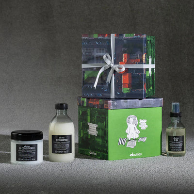 Davines OI Traditional Gift Set including OI Shampoo, Conditioner, and Oil, beautifully packaged in colorful gift boxes.
