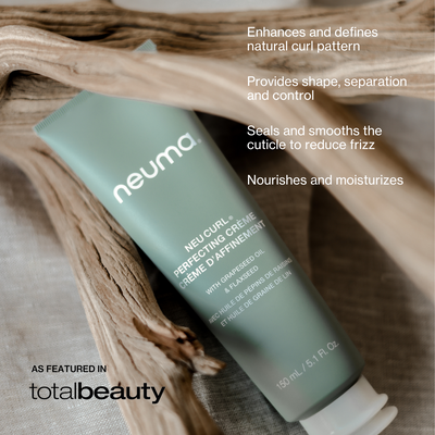 Neu Curl Perfecting Crème tube on natural wood background, enhancing curls and reducing frizz with moisture and shine.