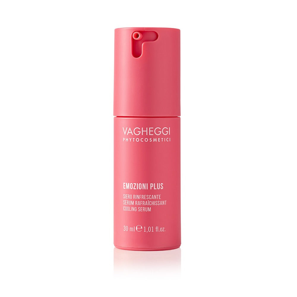 Emozioni Plus Cooling Serum in a pink bottle, soothing and refreshing skin with turmeric and hyaluronic acid.