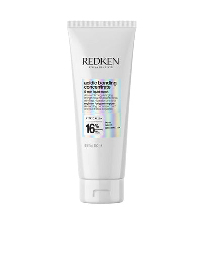 Redken Acidic Bonding Concentrate Liquid Mask in a tube for strengthening and repairing damaged hair.