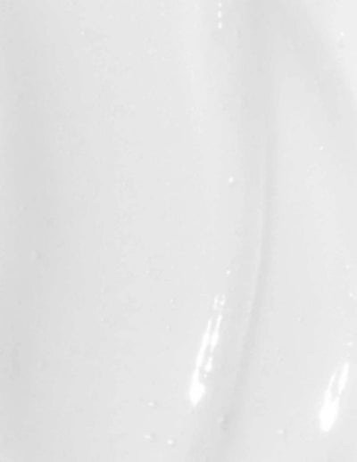 Smooth, creamy texture of Redken Blondage High Bright Conditioner for nourishing and enhancing blonde hair vibrancy.