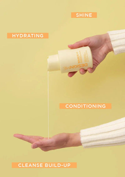 Hand holding a bottle of DesciGnome hair product pouring liquid, with text highlighting hydrating, conditioning, and shine benefits.