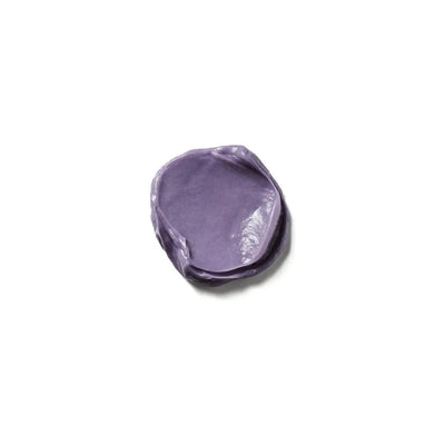 Purple color depositing mask on a white background, ideal for rejuvenating hair color and adding shine.
