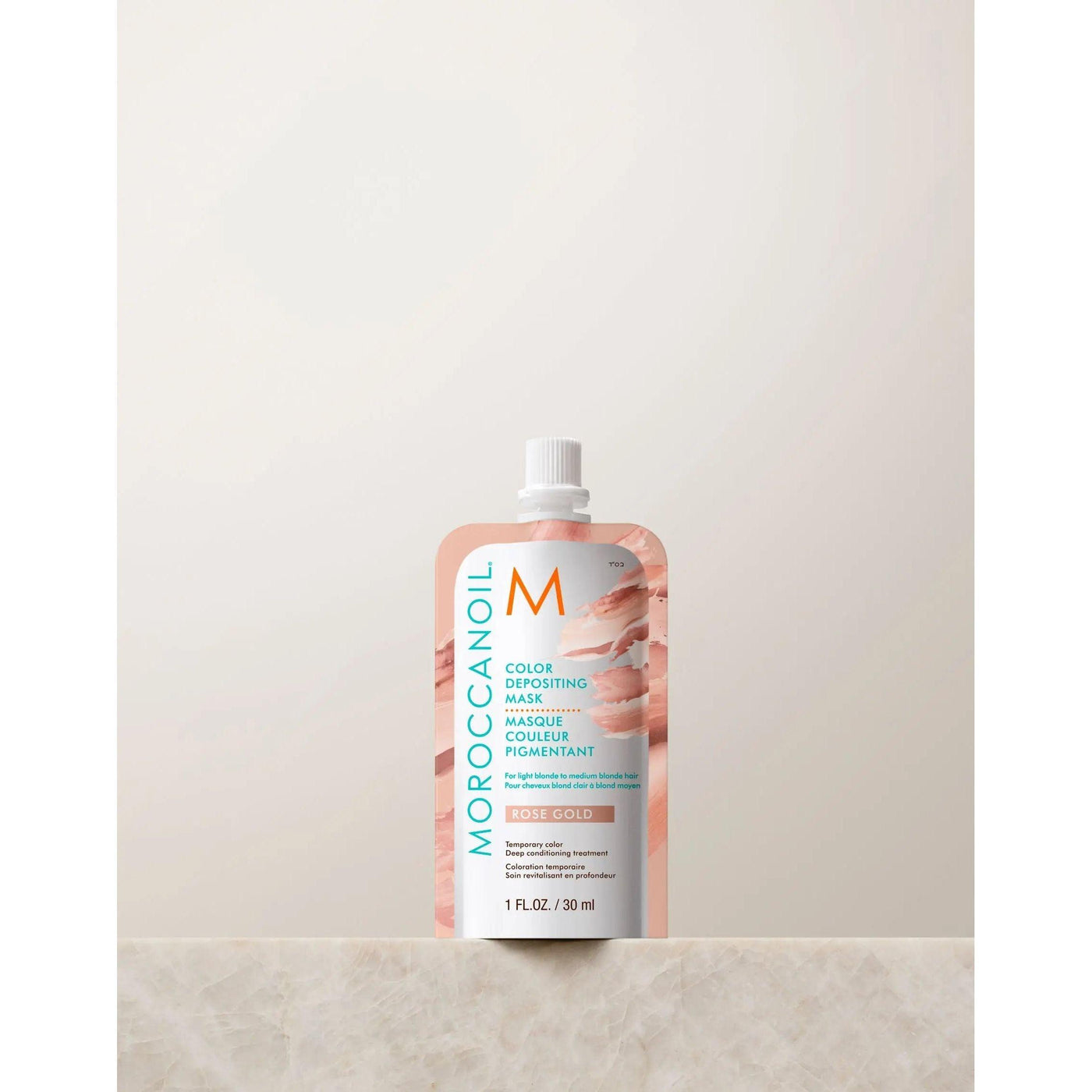 Moroccanoil Color Depositing Mask 30ml in Rose Gold, a rejuvenating hair mask for vibrant color enhancement.