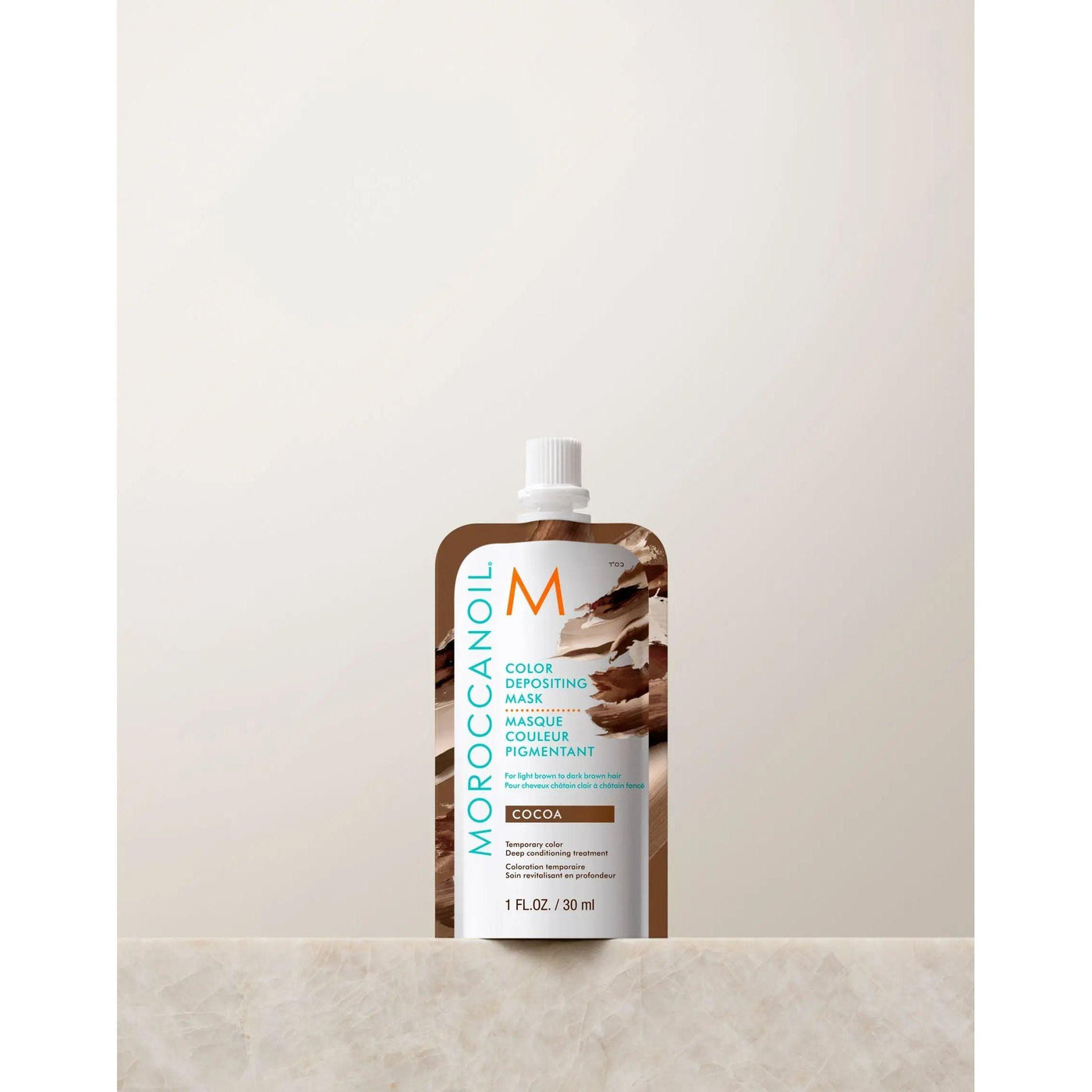 Moroccanoil Color Depositing Mask 30ml in Cocoa, rejuvenates hair color and conditions with argan oil for glossy shine.