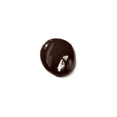 Dark color depositing mask texture showcasing rich, glossy consistency for enhanced hair color and conditioning.