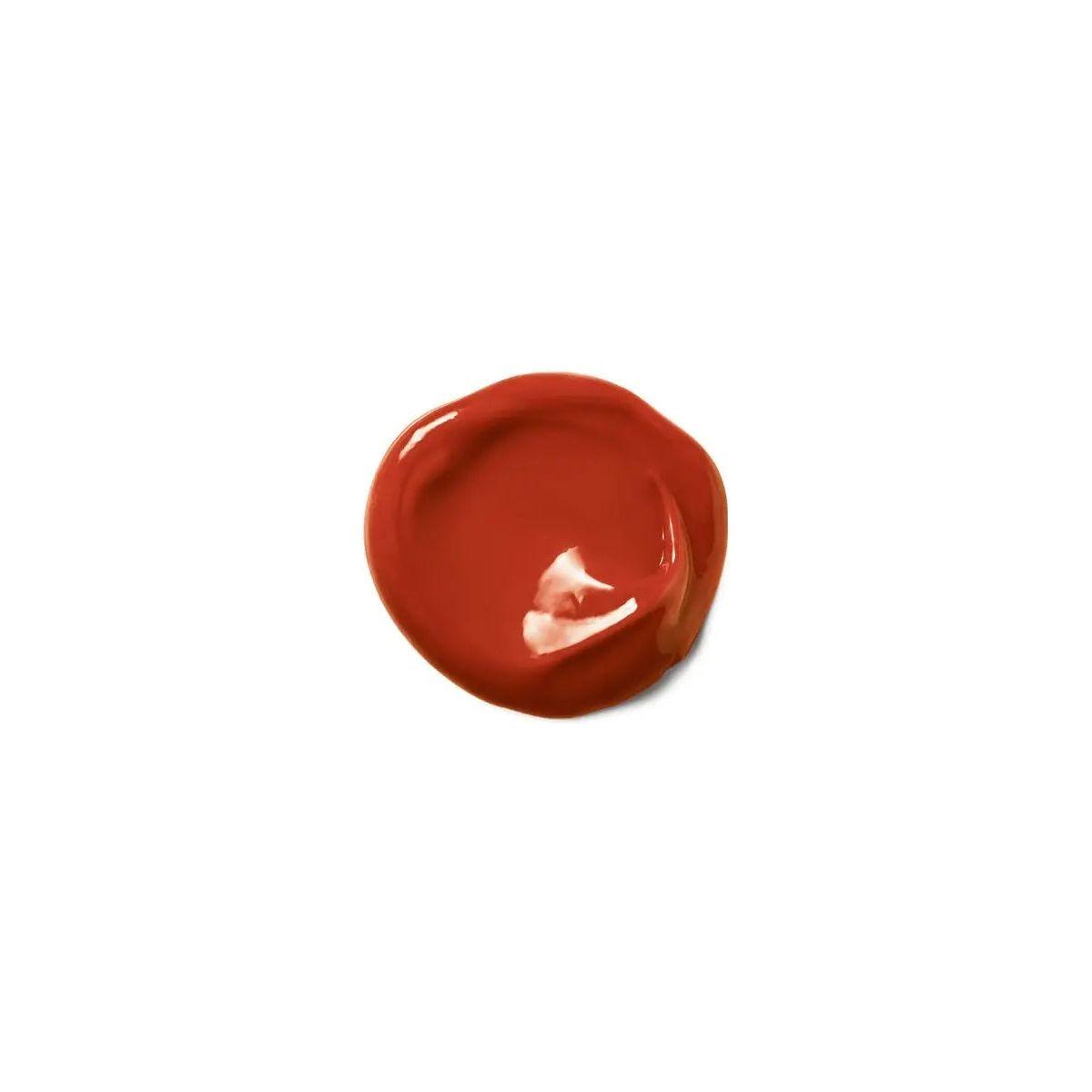 Rich red color deposit from Moroccanoil Color Depositing Mask, ideal for enhancing hair color and shine.