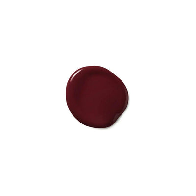 Moroccanoil Color Depositing Mask swatch in deep burgundy hue, showcasing rich color and glossy texture.