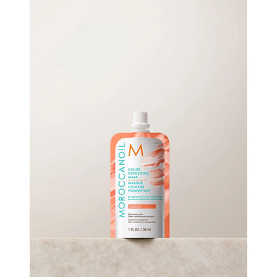 Moroccanoil Color Depositing Mask 30ml in Coral packaging, designed to enhance hair color and shine with argan oil.