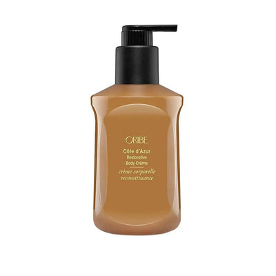 Oribe Côte d'Azur Restorative Body Crème 300 ml bottle with pump for deep hydration and luxury skincare.