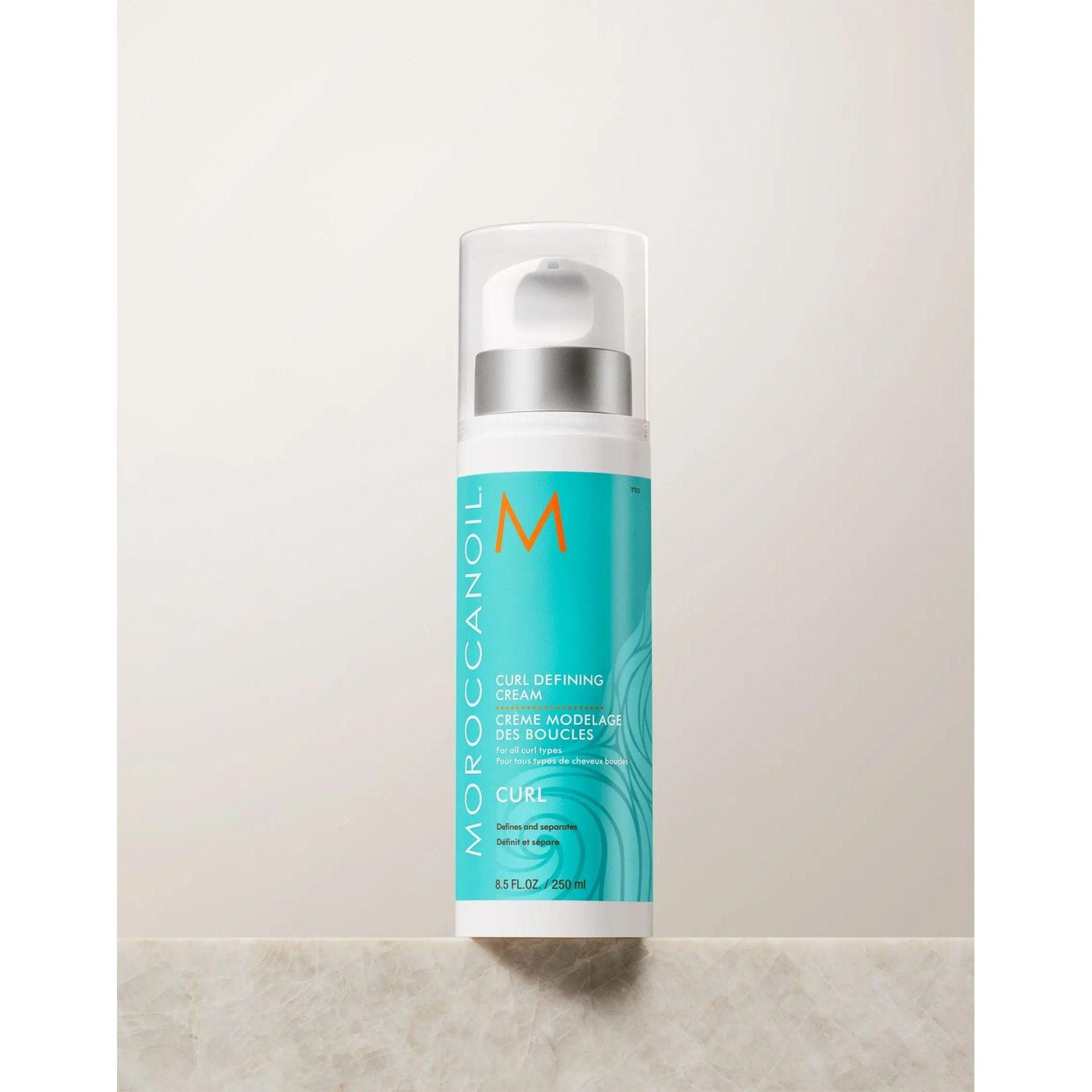Moroccanoil Curl Defining Cream bottle for naturally curly hair, offering conditioning, hold, and humidity resistance.