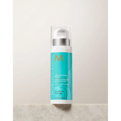 Moroccanoil Curl Defining Cream bottle for naturally curly hair, offering conditioning, hold, and humidity resistance.