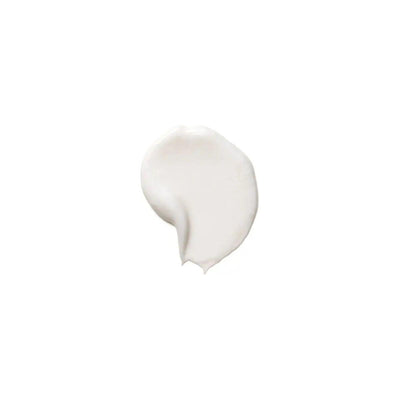 Curl Defining Cream swatch showcasing its creamy texture for enhancing natural curls and waves.