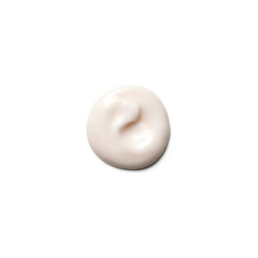 Curl Enhancing Conditioner creamy texture, showcasing nourishing ingredients for soft, defined curls without frizz.