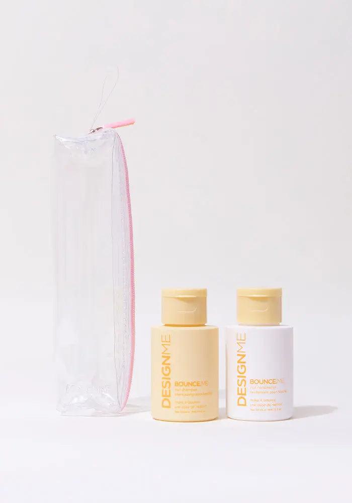 Travel-size BOUNCE.ME curl shampoo and conditioner set with clear pouch for great hair days.
