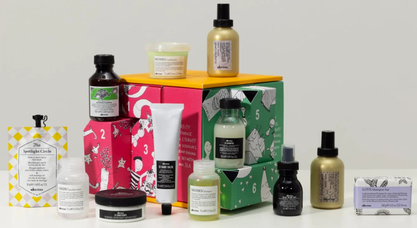 Davines Advent Calendar Gift Set featuring 12 mini hair care products in colorful festive packaging.