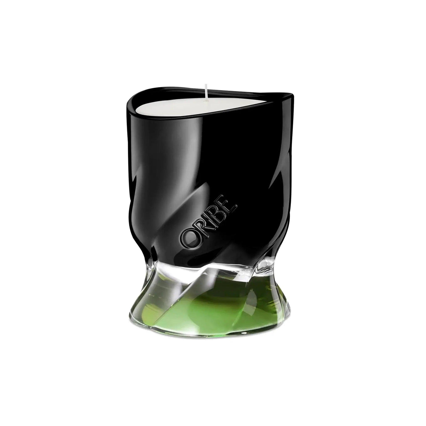 Oribe Desertland scented candle in a stylish black and green holder, showcasing a modern design perfect for home decor.