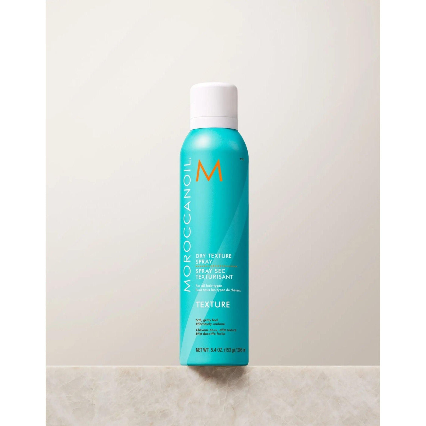 Moroccanoil Dry Texture Spray bottle featuring argan oil for effortless, textured hairstyles with long-lasting hold.
