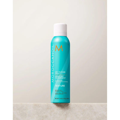 Moroccanoil Dry Texture Spray bottle featuring argan oil for effortless, textured hairstyles with long-lasting hold.