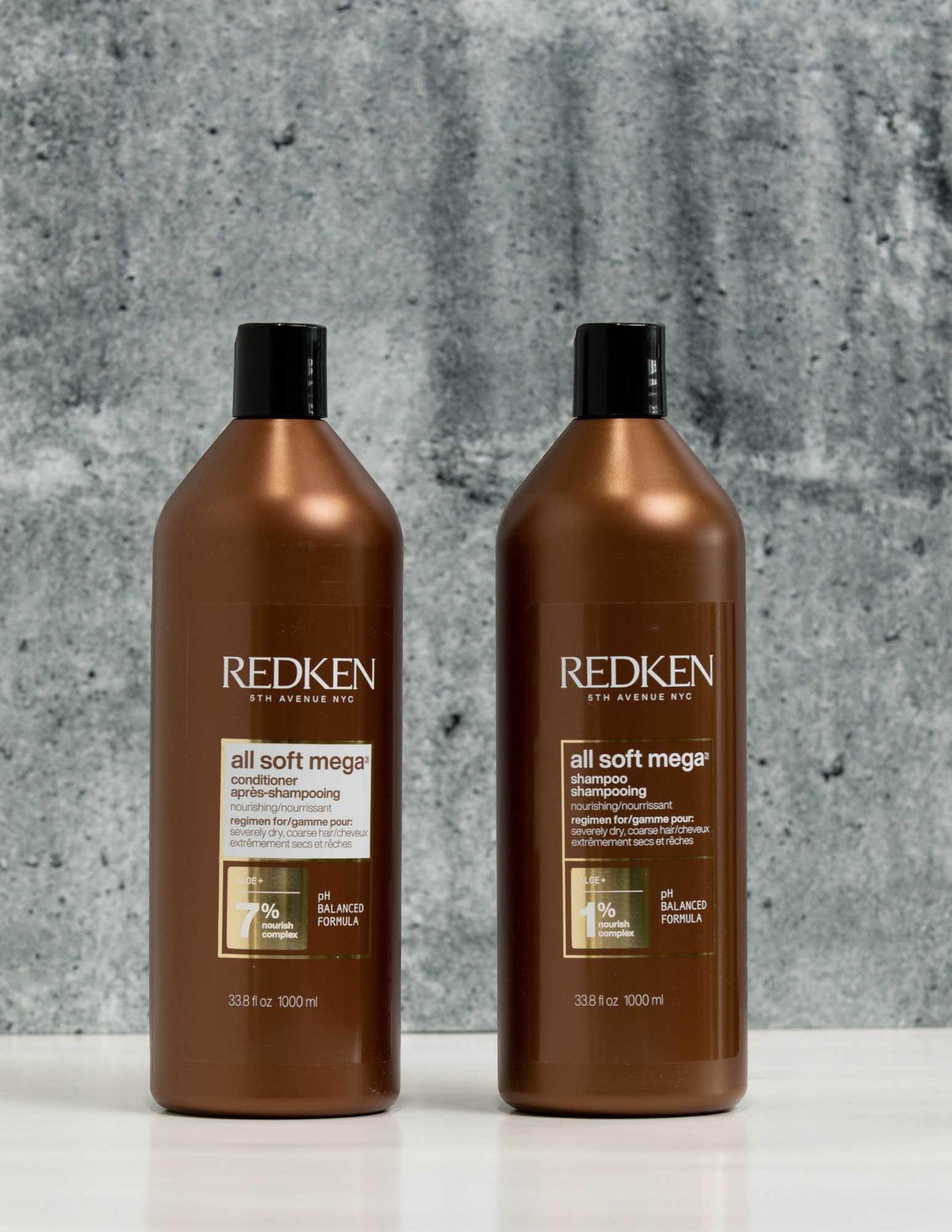 Redken Duo Liters All Soft Mega Curls Shampoo and Conditioner set on a sleek background, ideal for curly hair hydration.