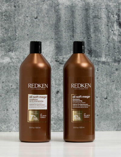 Redken Duo Liters All Soft Mega Curls Shampoo and Conditioner set on a sleek background, ideal for curly hair hydration.