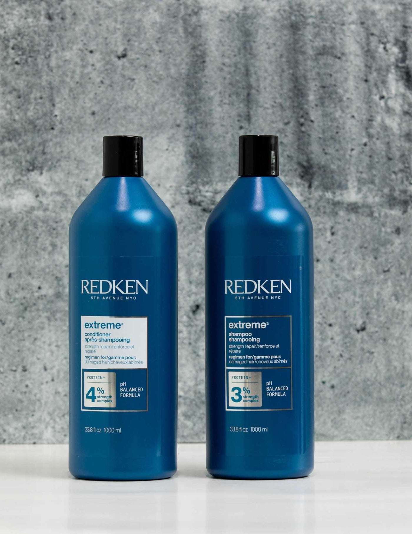 Redken Duo Liters - Extreme Shampoo and Conditioner set for repairing and strengthening damaged hair, suitable for all hair types.