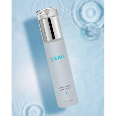 Essential Toner by L'Eau in sleek bottle, enriched with Snow Algae for firmer, youthful skin.
