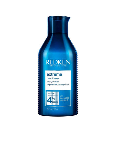 Redken Extreme Conditioner 300ml for strengthening damaged hair with professional-grade formula. Ideal for all hair types.