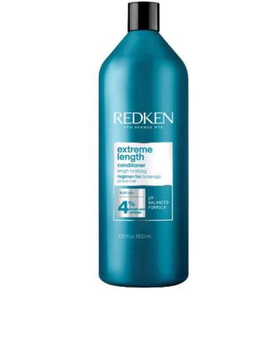 Redken Extreme Length Conditioner 1L bottle designed to strengthen hair and promote length retention, suitable for all hair types.