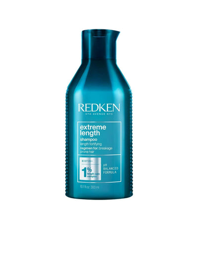 Redken Extreme Length Shampoo bottle for healthy hair growth and strength, suitable for all hair types and textures.