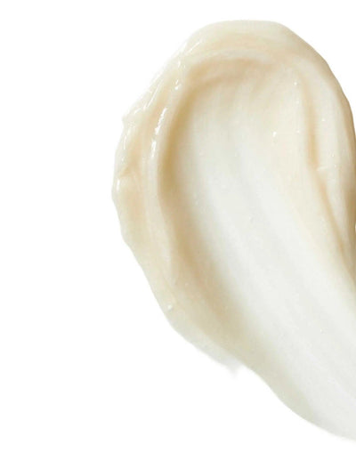 Swatch of Redken Extreme Length Triple Action Treatment showing creamy, rich texture for healthier hair.