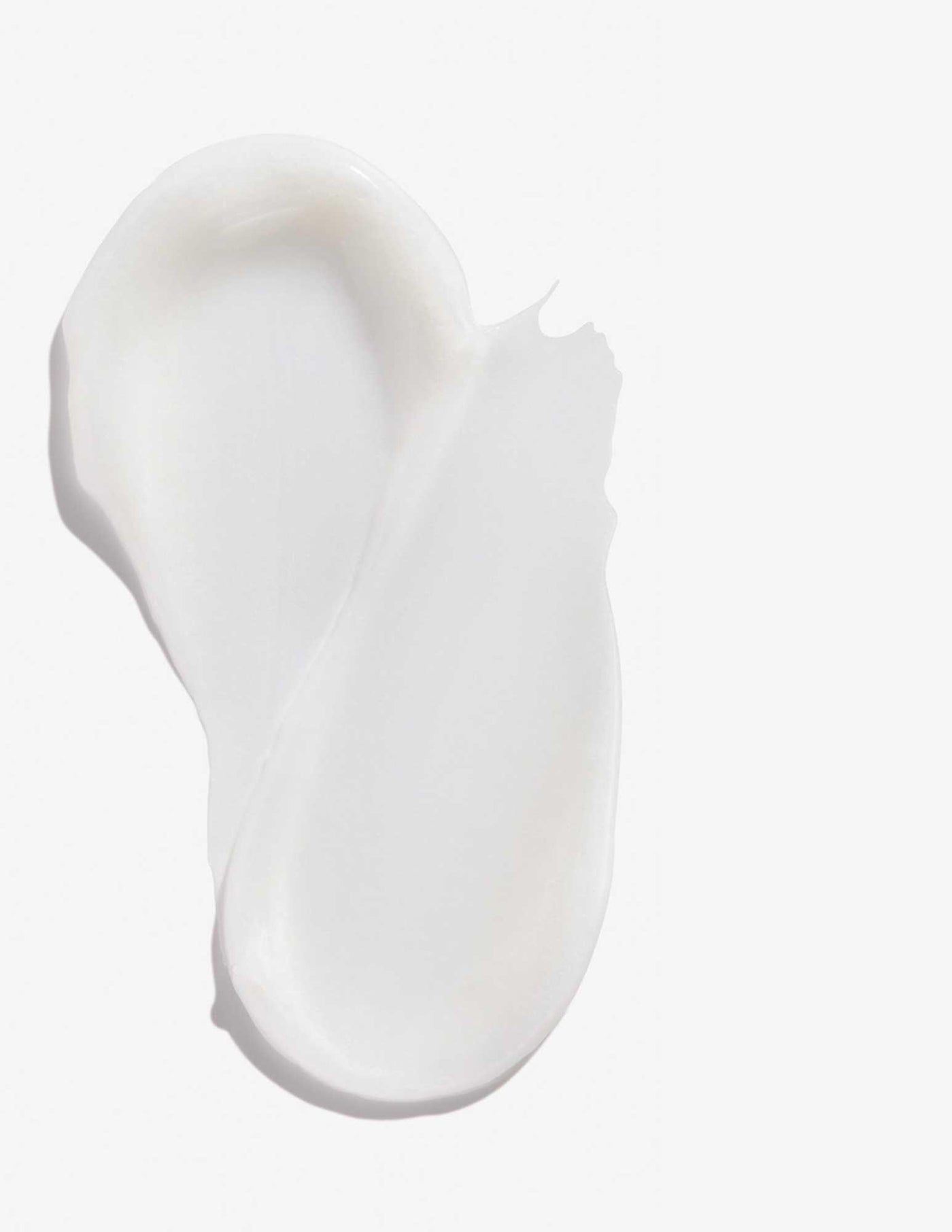 Smooth, creamy texture of Redken Extreme Mask for intensive hair treatment and damage repair.