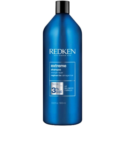 Redken Extreme Shampoo 1L bottle for strengthening and fortifying distressed hair with a pH balanced formula.