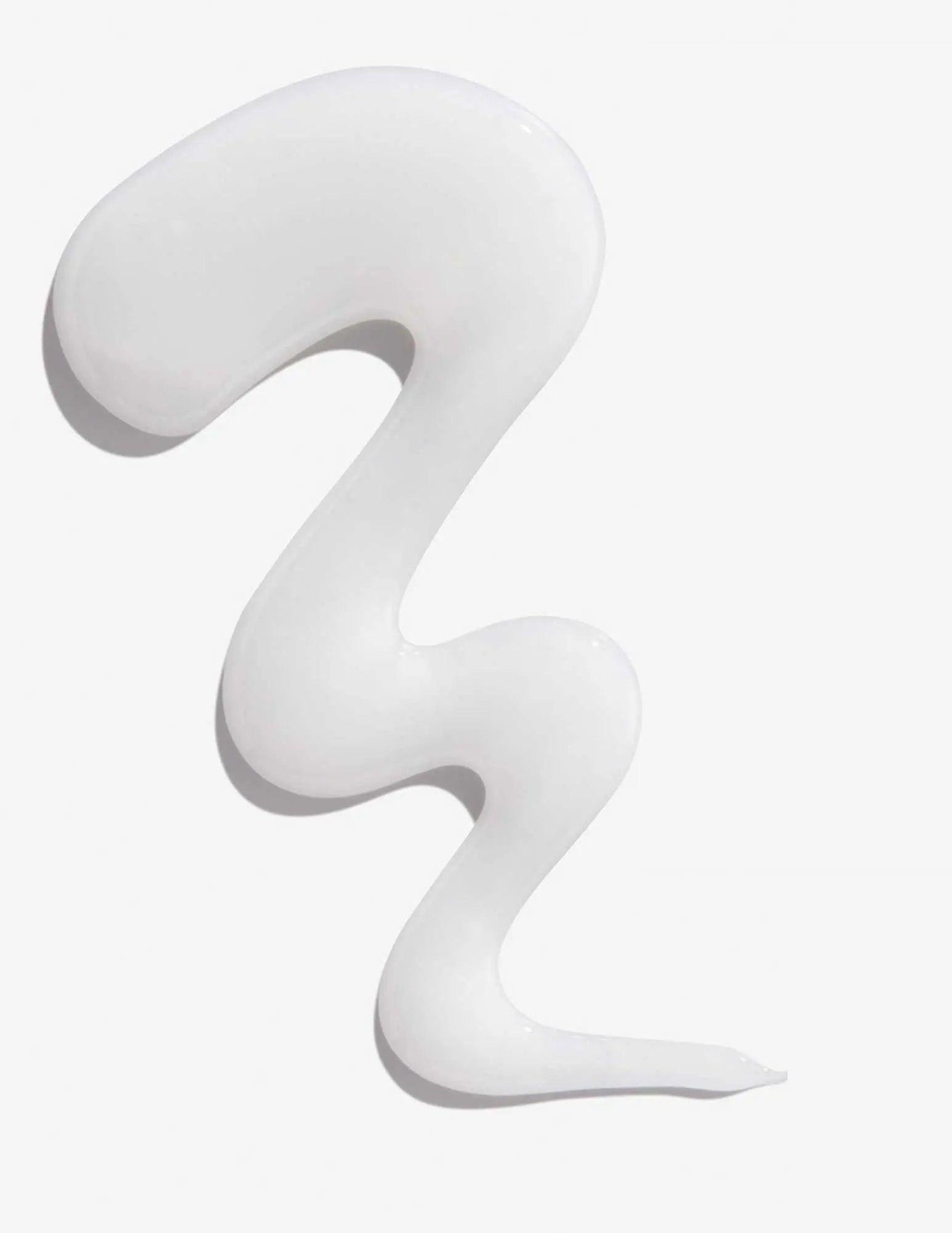Smooth, white hair product swirl, representing a fortifying shampoo for damaged hair.