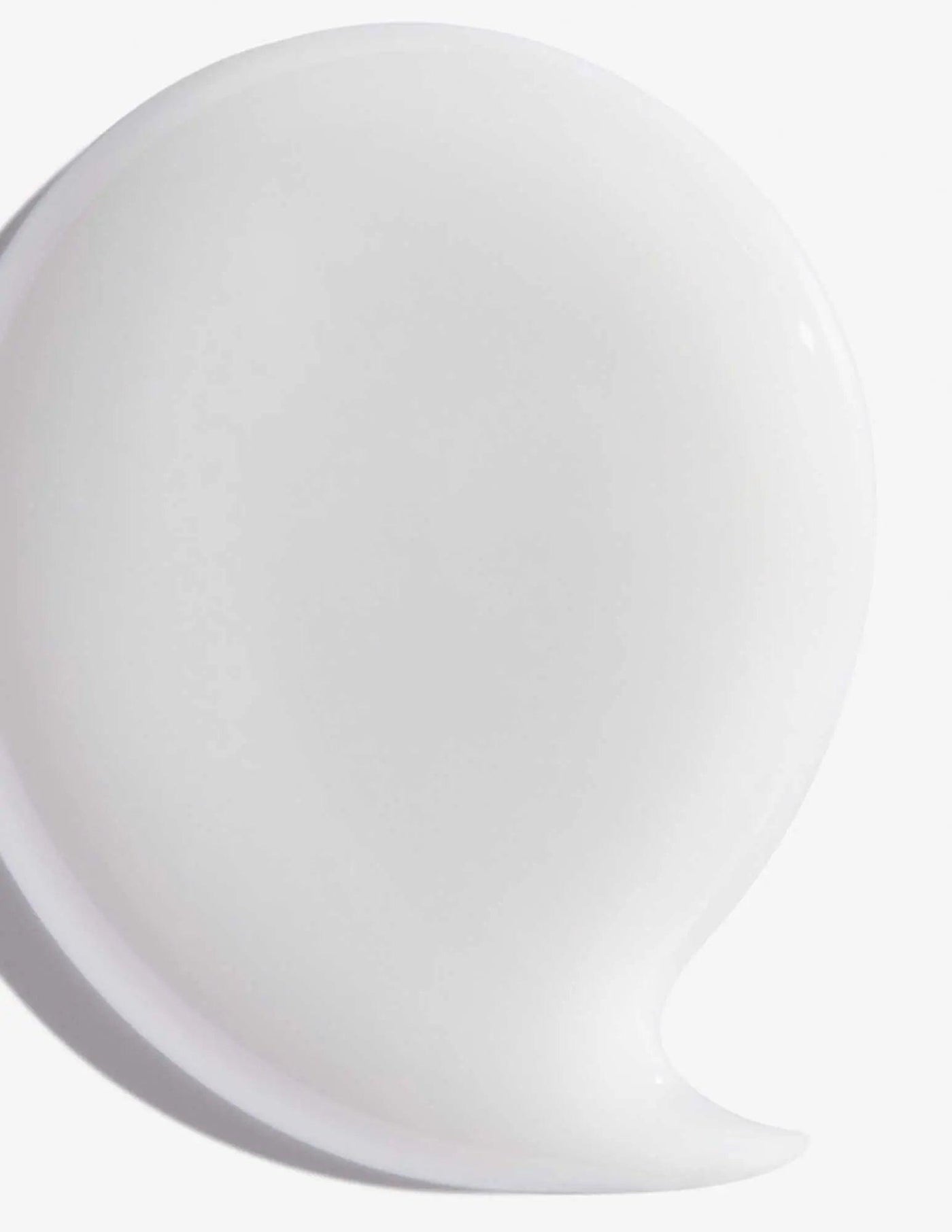 White creamy texture of Redken Hair Cleansing Cream Shampoo for effective hair cleansing and revitalization.