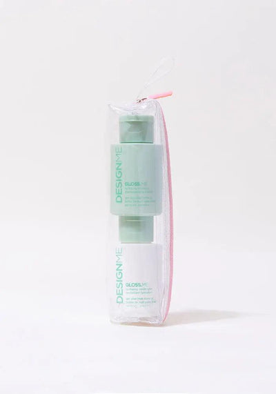 Travel-size GLOSS.ME hydrating shampoo and conditioner ornament in a clear package, perfect for holiday gifting.