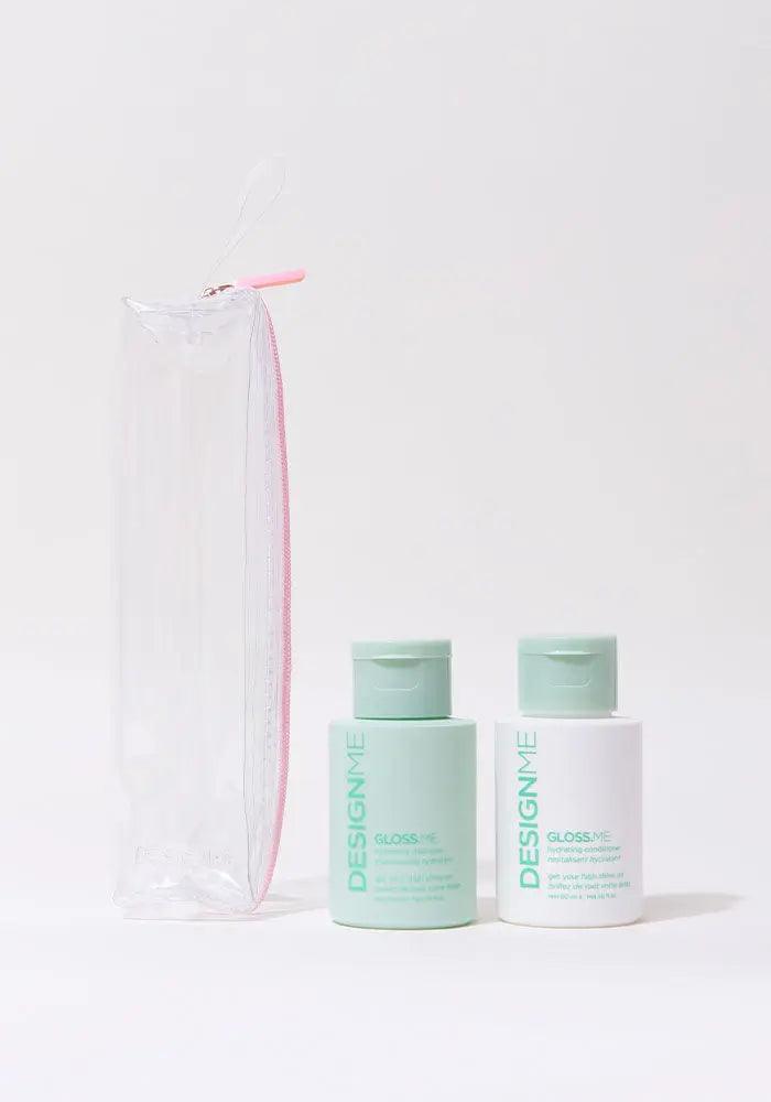 Travel-size GLOSS.ME hydrating shampoo and conditioner in a clear pouch, perfect for festive gifting and hair care routines.