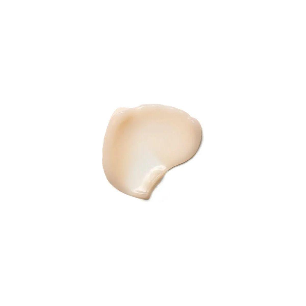 Swatch of Moroccanoil Hydrating Styling Cream showcasing its creamy texture, ideal for nourishing and taming frizzy hair.