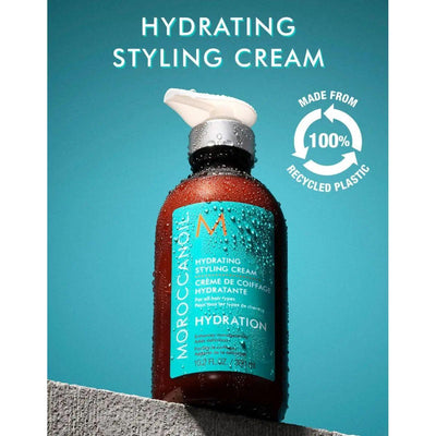 Moroccanoil Hydrating Styling Cream bottle, made from 100% recycled plastic, promoting hydration and frizz control.