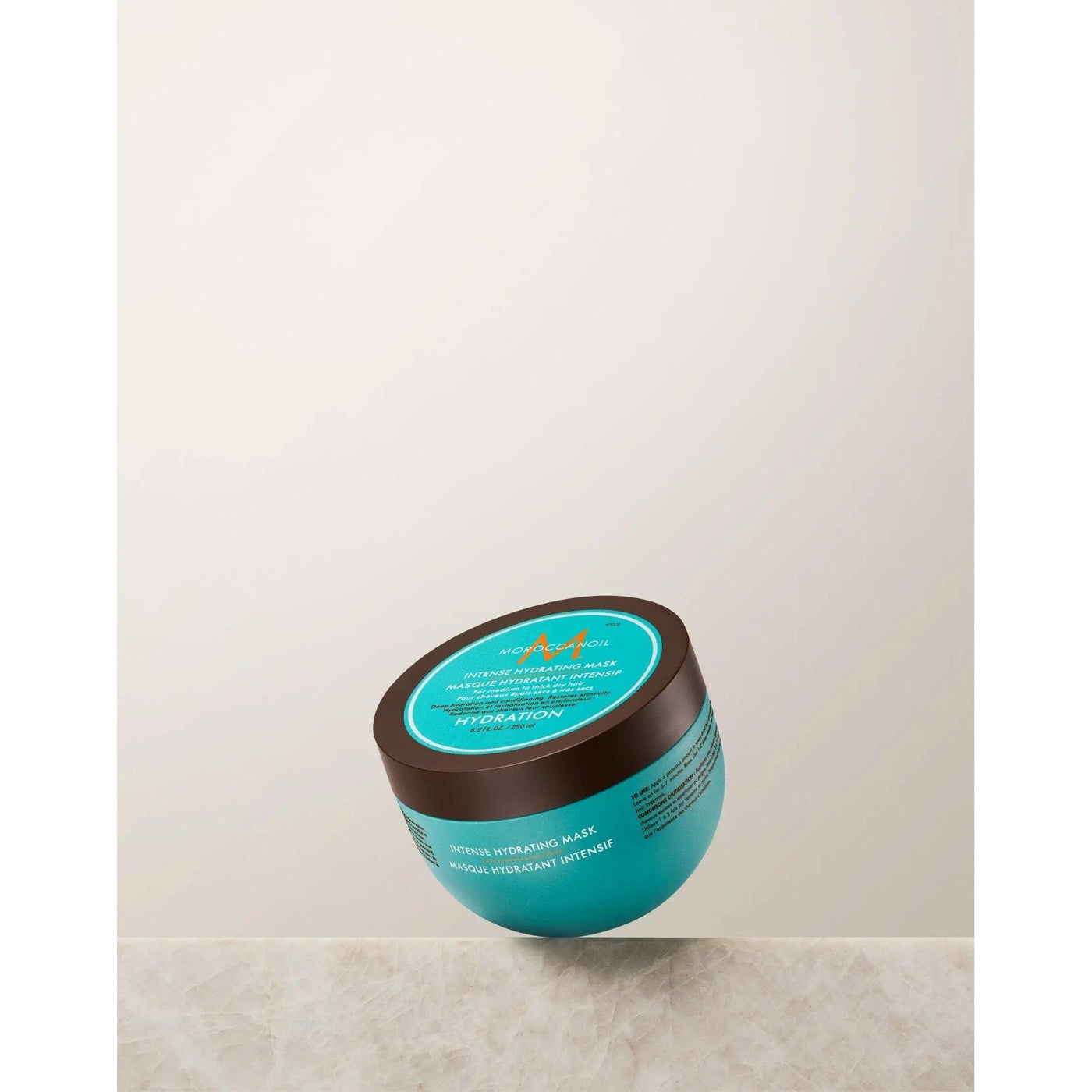 Moroccanoil Intense Hydrating Mask jar, rich conditioner for medium to thick dry hair, promoting hydration and shine.