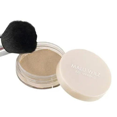 Malu Wilz Just Minerals Powder Foundation in jar with a makeup brush, ideal for a natural, flawless complexion.