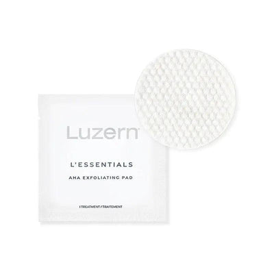 Luzern L'Essentials AHA Exfoliating Pads packaging and pad, designed for gentle skin exfoliation and radiance improvement.