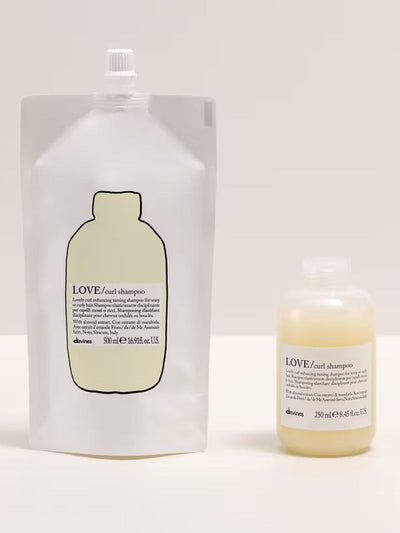 Love Curl Shampoo Refill pouch and bottle designed for wavy and curly hair, enriched with almond extract for enhanced curl definition.
