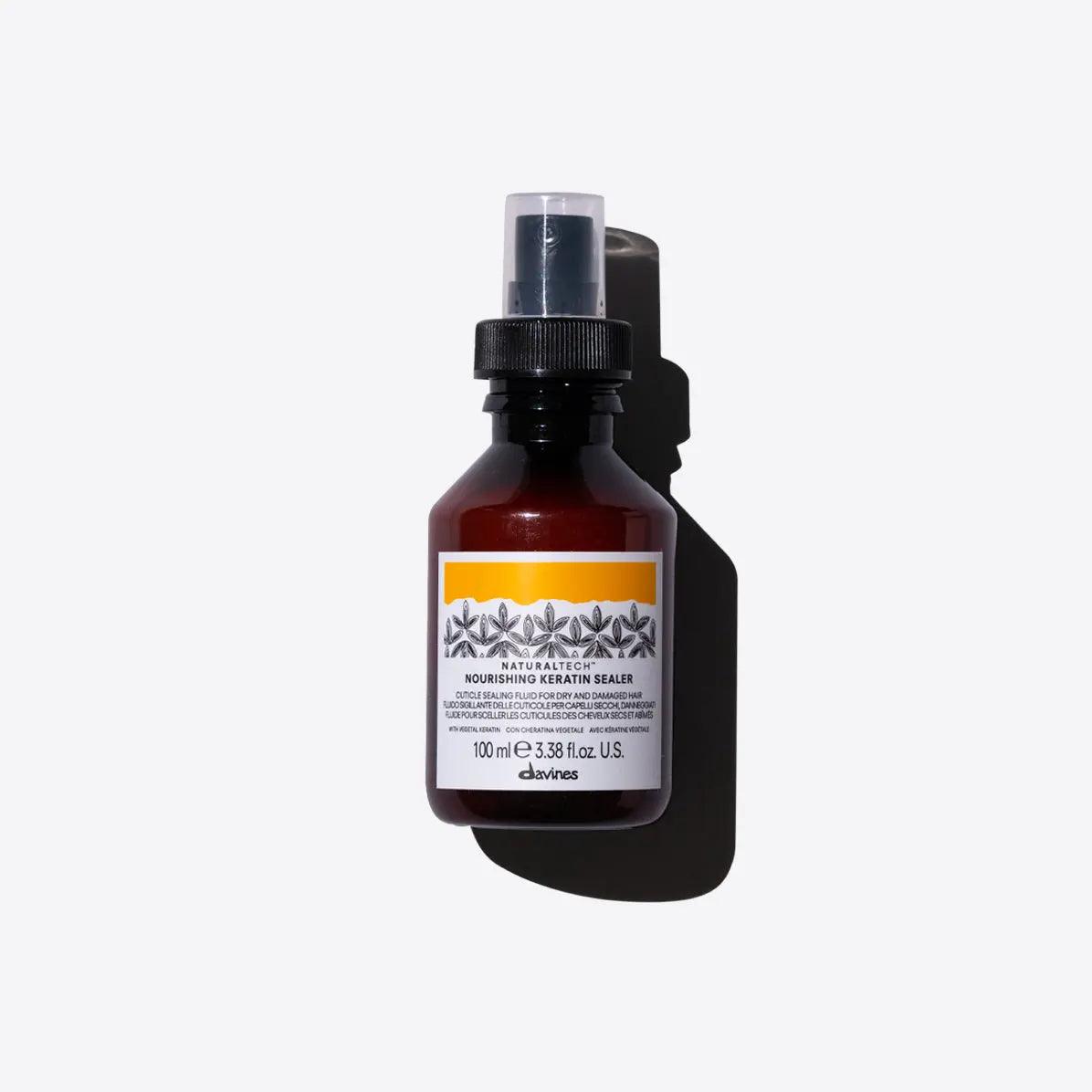 Naturaltech Nourishing Keratin Sealer in a spray bottle, designed to strengthen hair and prevent split ends with natural ingredients.
