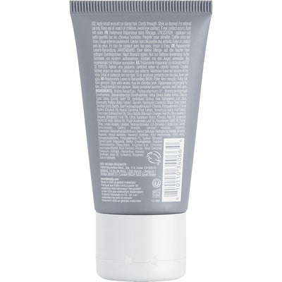 Neu Repair Leave-in Treatment back view, showcasing nourishing ingredients for smooth, revitalized hair.