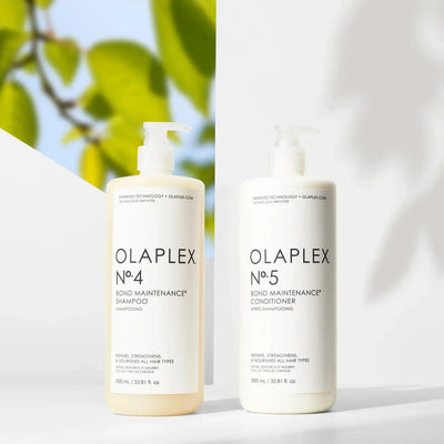 Olaplex Nº.4 Bond Maintenance Shampoo and Nº.5 Conditioner for all hair types, repairing and hydrating color-treated hair.